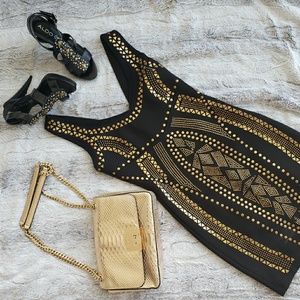 Gold studded black dress